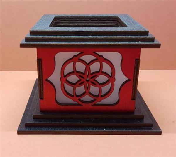 Tanno Design® Japan Kerzenhalter Blume des Lebens klein mit Teelichtfunktion schwarz/rot